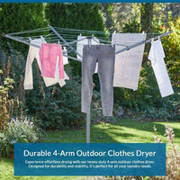 Four-Arm Rotary Washing Line loaded with washing in a garden