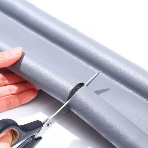 Door Sealing Strip being cut to length with scissors